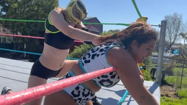 Nadia Stinkfaces Masked Wrestler