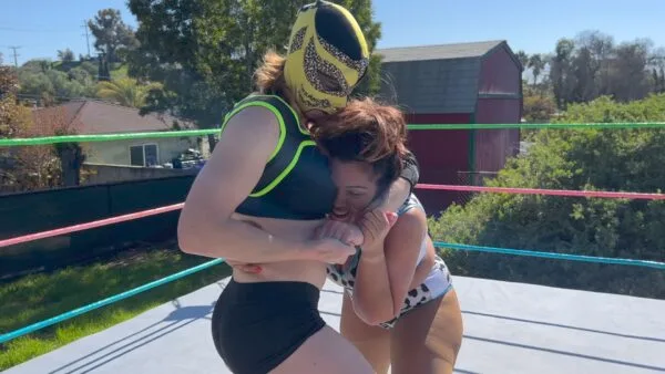 Nadia Stinkfaces Masked Wrestler
