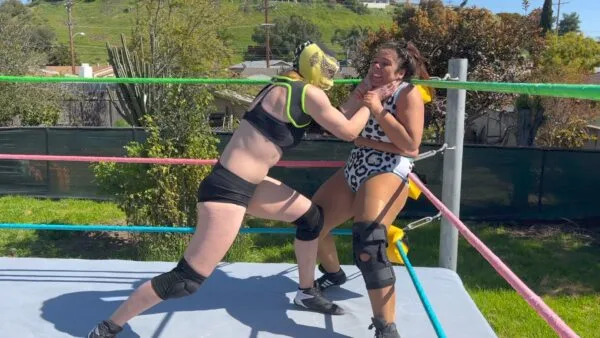 Nadia Stinkfaces Masked Wrestler